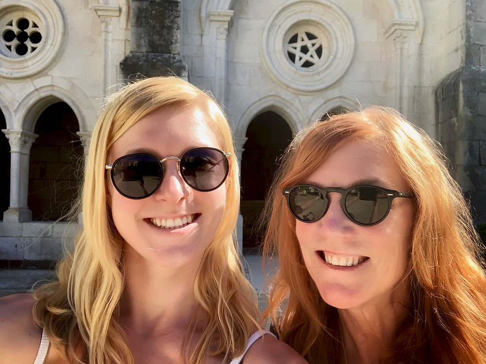 still smiling despite a tiff over where to park at Alcobaça Monastery