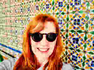 me, enjoying the beautiful tiles in the Casa de PIlatos in Seville