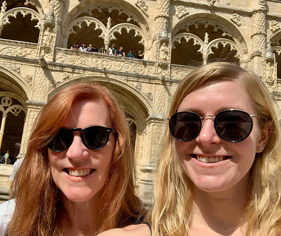 my daughter and I admiring the Manueline cloisters at Jerónimos Monastery in Belem