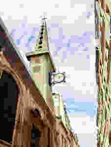 unique pointy tower of Eglise Saint-Louis-en-L'Île