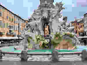 the Four Rivers Fountain by Bernini in the center of the Piazza Navona