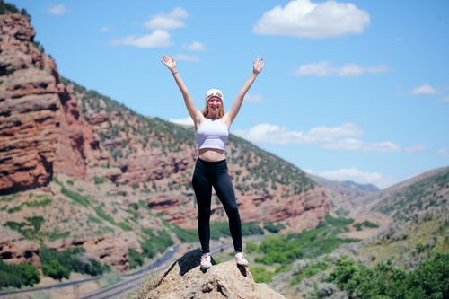 a happy traveler enjoying her escape