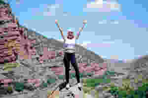 a happy traveler enjoying her escape
