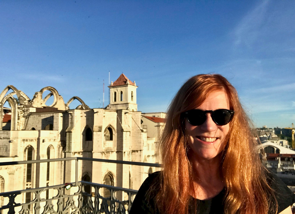 me, at the highest viewpoint on the Santa Justa Elevator at 7:30 am to beat the crowds