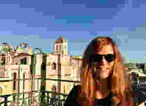 me, at the highest viewpoint on the Santa Justa Elevator at 7:30 am to beat the crowds