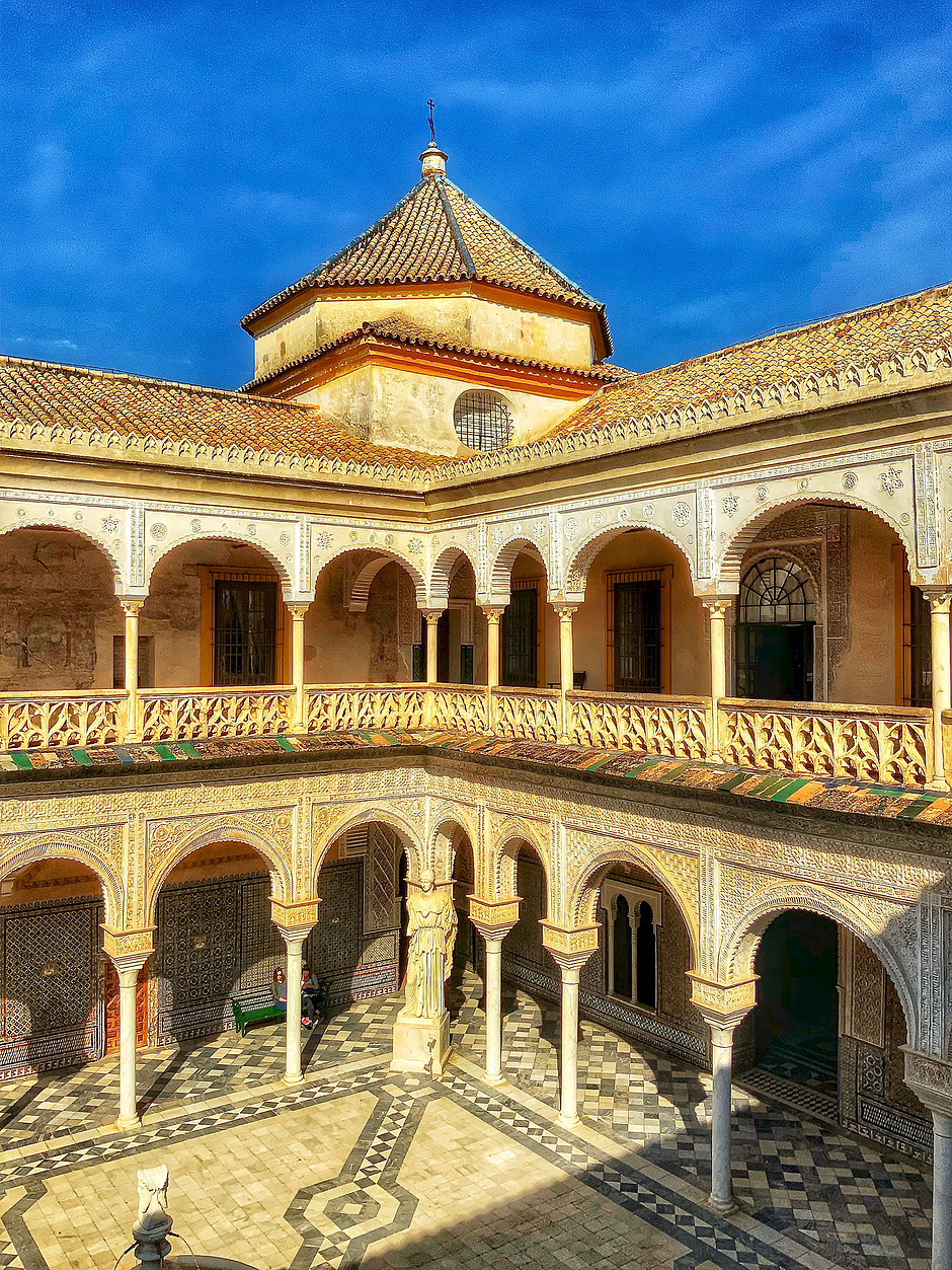 the courtyard of the Casa de Pilatos, a hidden gem and unmissable site in Seville Spain