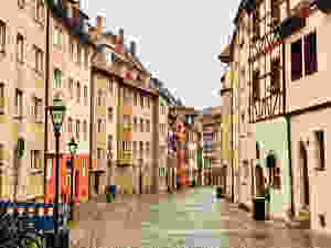 typical cute street with pastel colored houses in Bamberg