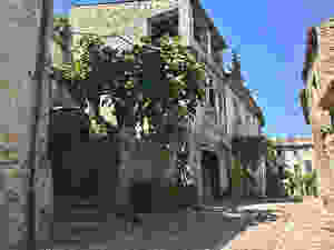 stony cobbled street and houses in Vaison-la-Romaine in Provence France