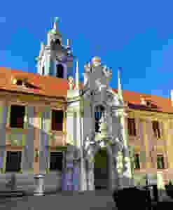 the Durnstein monastery courtyard with the Baroque church's portal and the blue tower