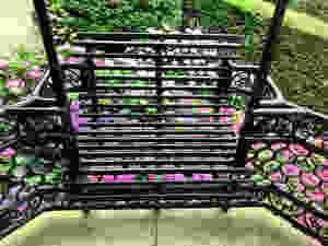 iron seats on a small balcony of El Capricho