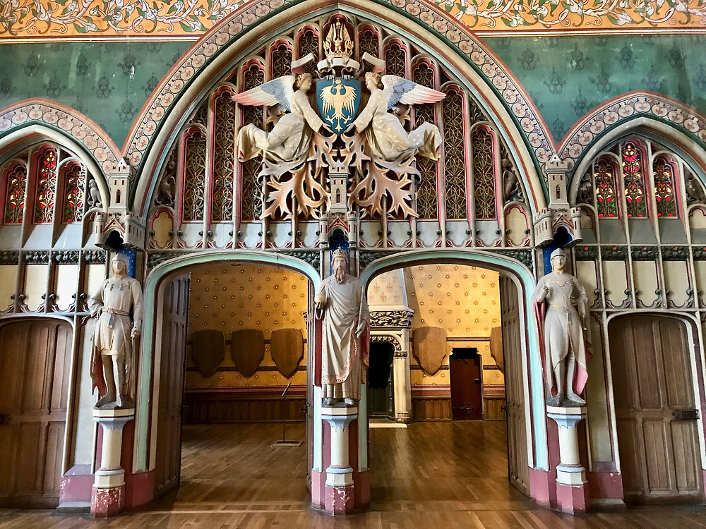 entrance to the Arms room with Charlemagne and his flunkies