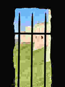 peaking through the window at the remains of the chateau's curtain wall