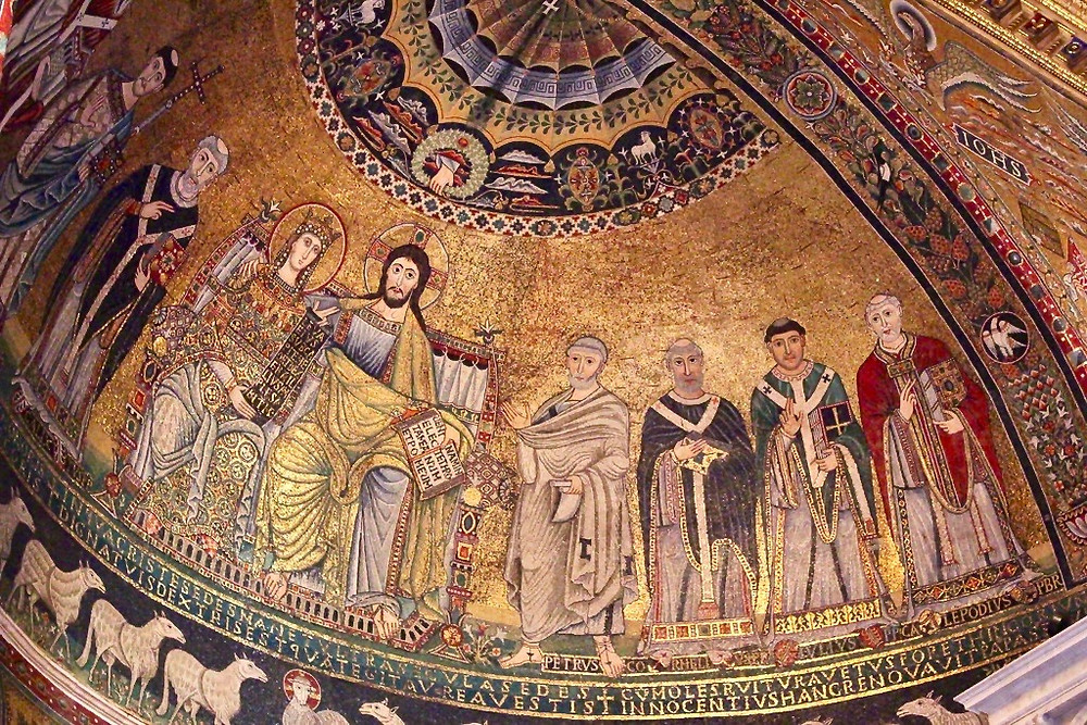 12th century mosaics showing Christ and his mother flanked by saints in the Santa Maria basilica in Trastevere