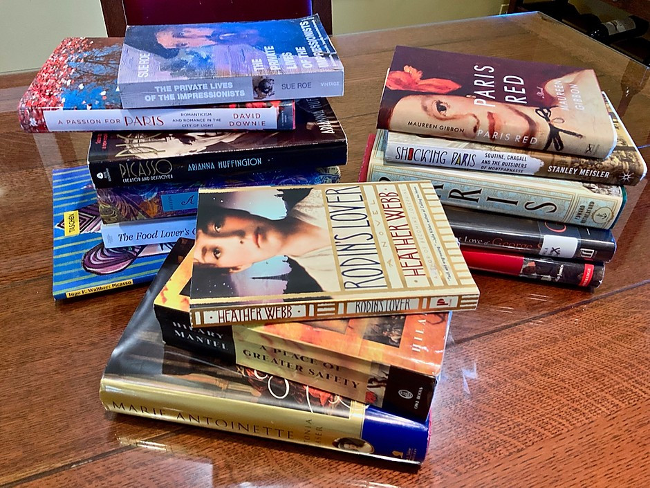 my current stash of books about Paris