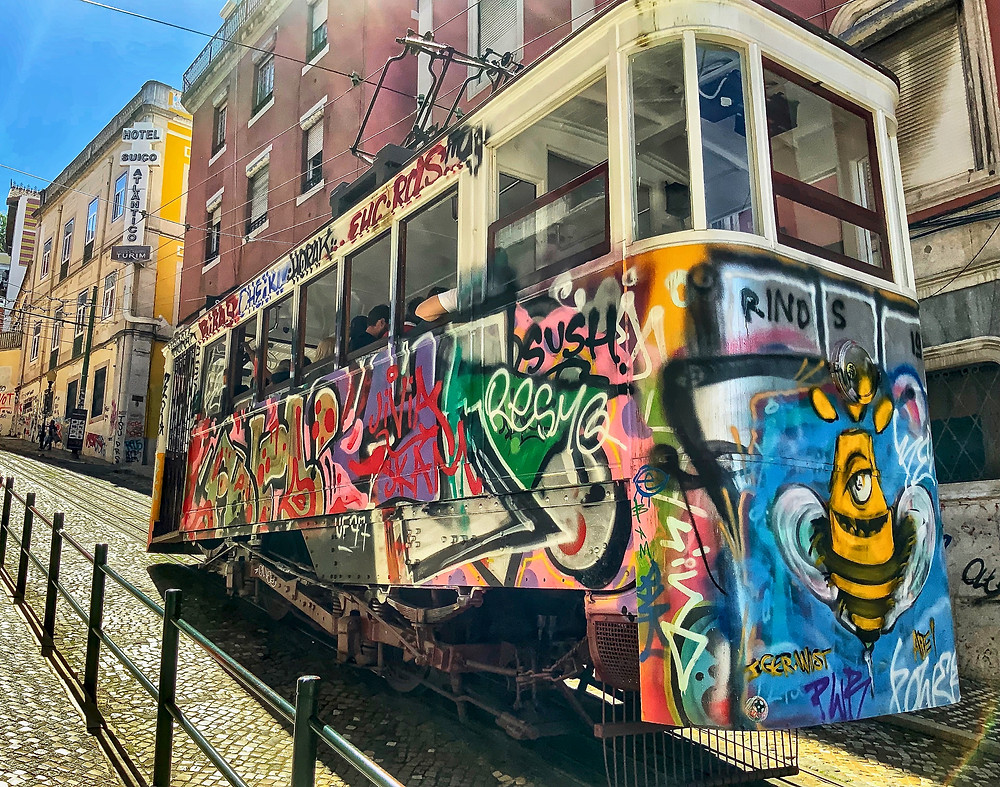 the colorful Elevador da Glória funicular.