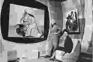 Peggy and Max with his painting, The Kiss, 1927, at the Art of this Century Gallery