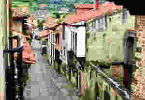 a cobbled lane in the medieval village of Santillana del Mar in Cantabria Spain