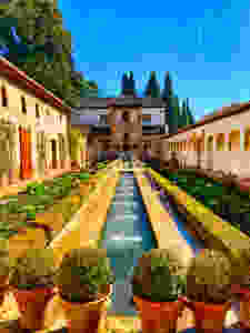 the long reflecting pool in the Court of la Acequia