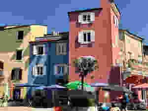 pretty pastel houses on Tartini Square in Piran