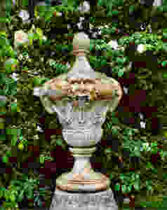 a little sculpture set amid the plantings