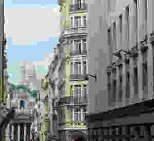 view of Notre-Dame-de-Lorette and the Sacre Coeur from Lafitte Street