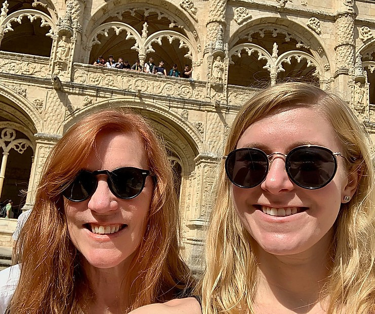 my daughter and I admiring the Manueline cloisters at Jerónimos Monastery in Belem