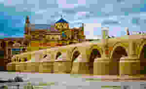 the Roman Bridge of Cordoba with a view of the Mezquita