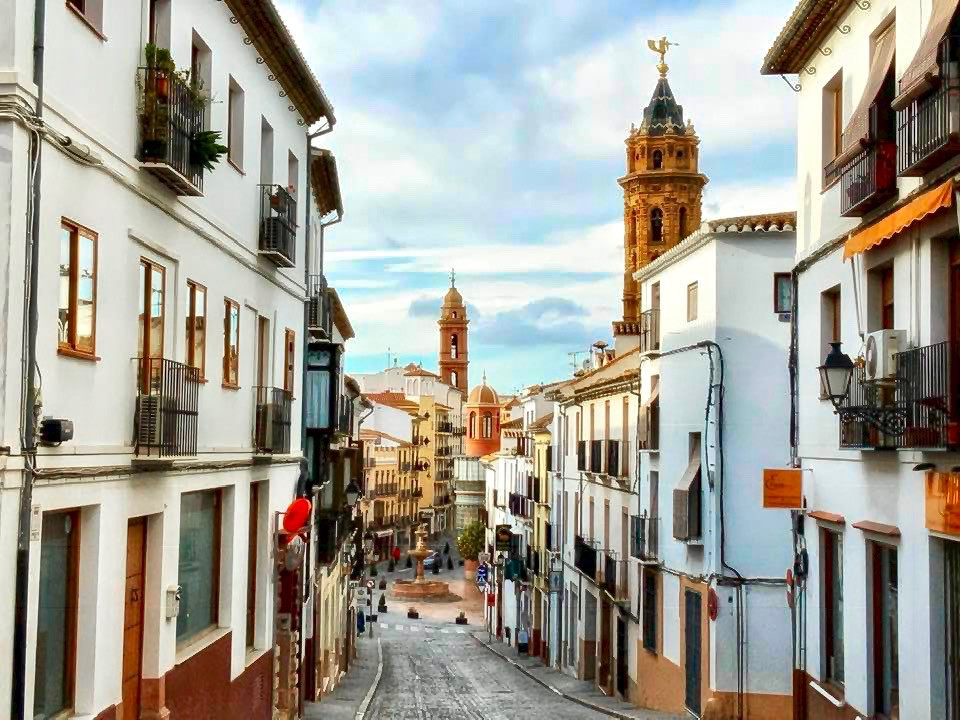 Calle Don Infante in Antequera, leading to the Plaza San Sebastián and its central fountain