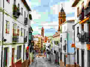 Calle Don Infante in Antequera, leading to the Plaza San Sebastián and its central fountain