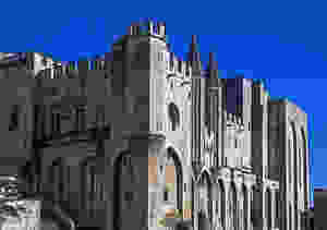 the forbidding Gothic exterior of the Pope's Palace in Avignon