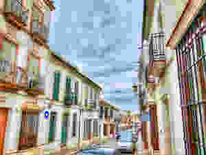 the picturesque Calle San Pedro in Osuna Spain