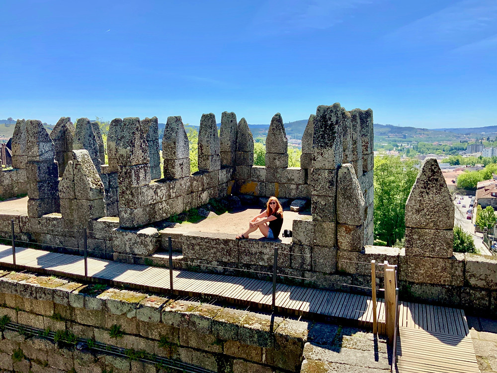 Here's me enjoying a crowds free UNESCO site, the castle in Guimaraes Portugal, 45 minutes from Porto