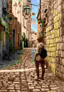 my daughter on the limestone streets of Hvar