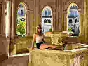 my daughter at the fountain overlooking the courtyard