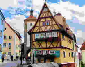 the iconic yellow timbered house on Plönlein in Rothenburg ob der Tauber