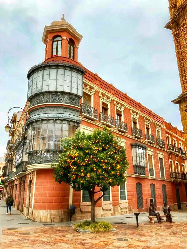 Antequera's main square, Plaza de San Sebastian with a sculpture by Pedro Fernández Roales of two of Antequera's most famous citizens
