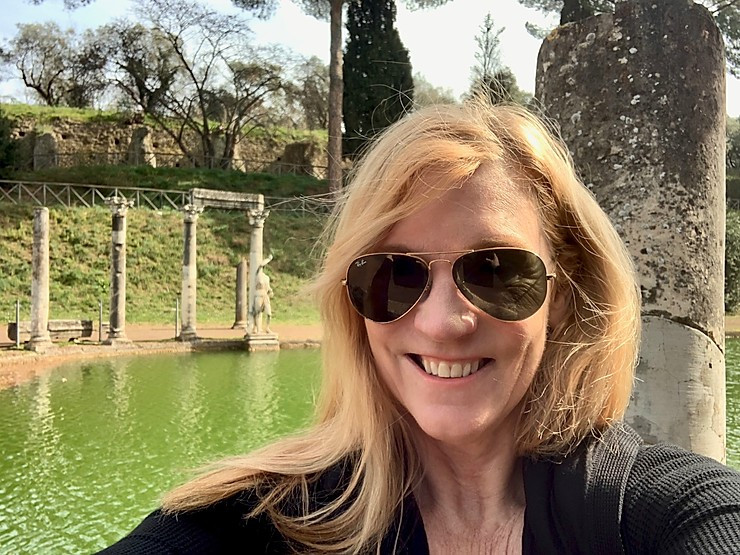 in Tivoli, smiling on the day before the security alert for Italy was raised to 4