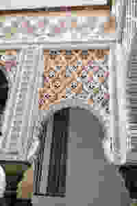 Courtyard of the Dolls with its tiny doll headsi n the Alcazar