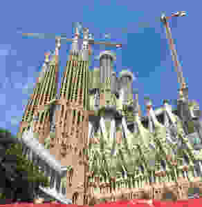 the Passion Facade of Sagrada Familia. The windows on the right are reminiscent of the stained glass windows on Gaudi's crypt of Colonia Güell