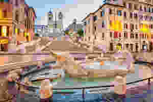 the Sinking Boat Fountain in the Piazza di Spagna in front of the Spanish Steps