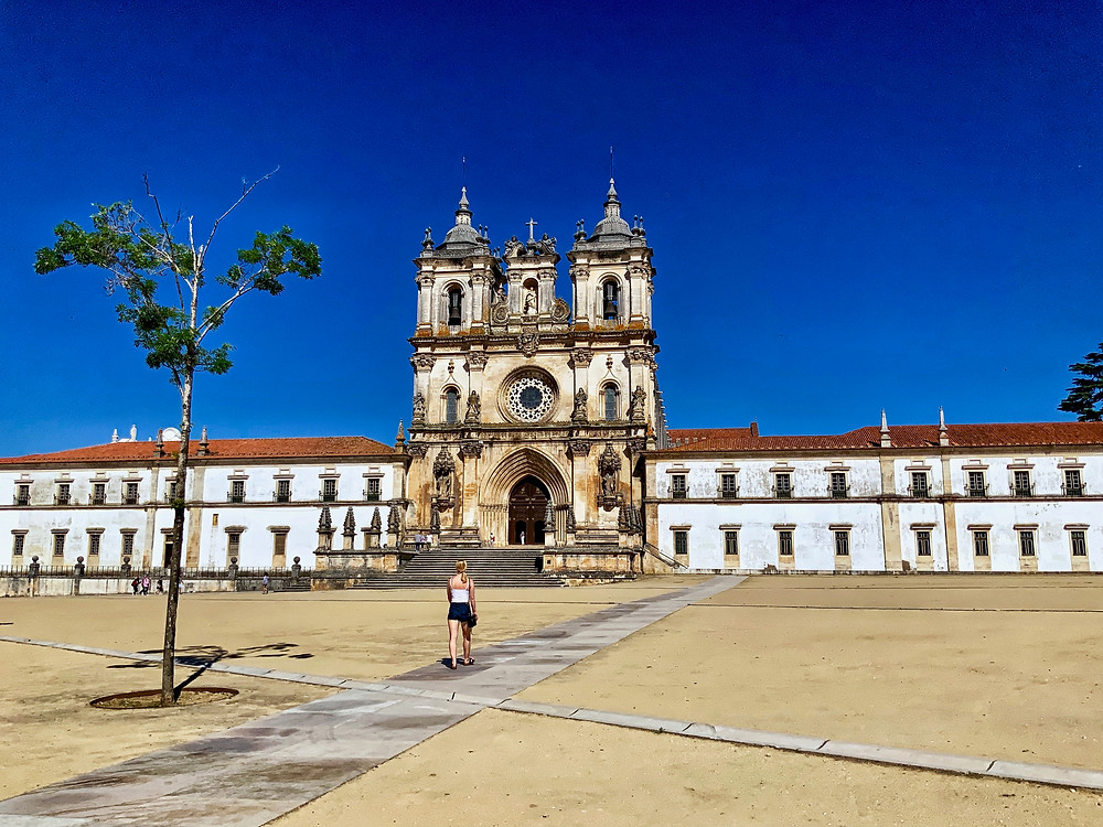the imposing entrance of the Alcobaça Monastery