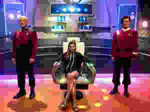 Gillian posing with wax Star Trek captains in LA