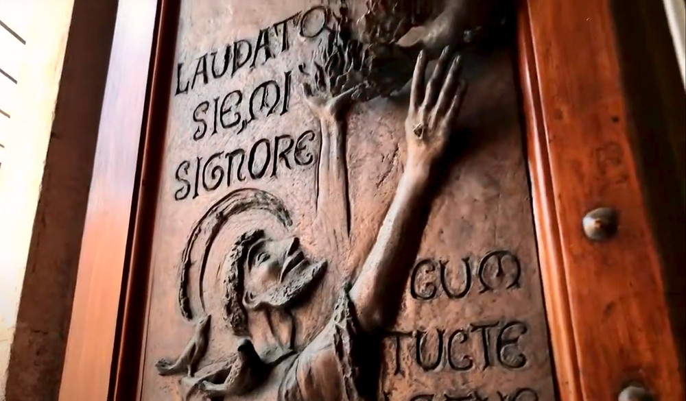 door with a relief of Saint Francis of Assisi