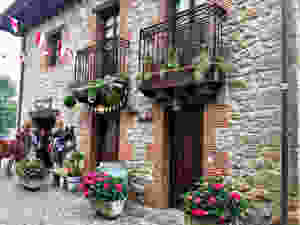 wrought iron balconies and flower pots in medieval Santillana del Mar
