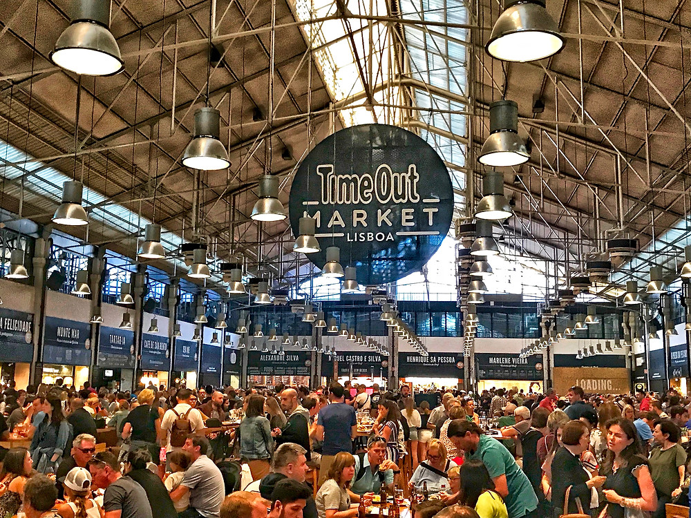 teeming crowds in the evening at Time Out Market