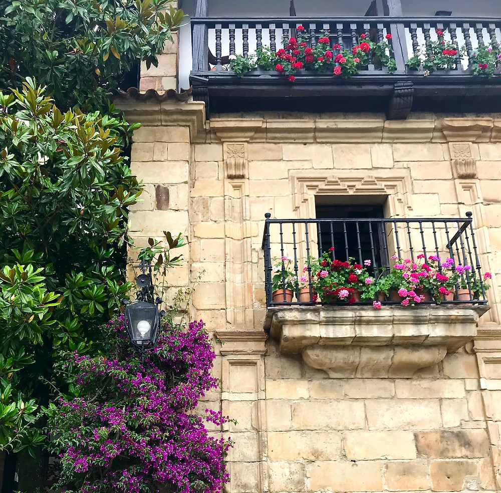 colorful window boxes in Santillana del Mar
