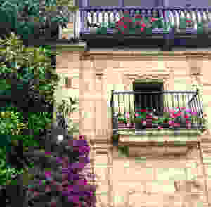 colorful window boxes in Santillana del Mar