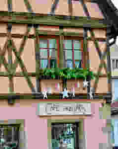 the pretty in pink Cafe Einzigartig, which translates to Cafe Unique