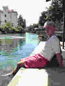my travel partner cooling off on a hot June day in Isle sur la Sorgue