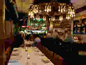 Garde Manger, with a massive period chandelier dominating the room